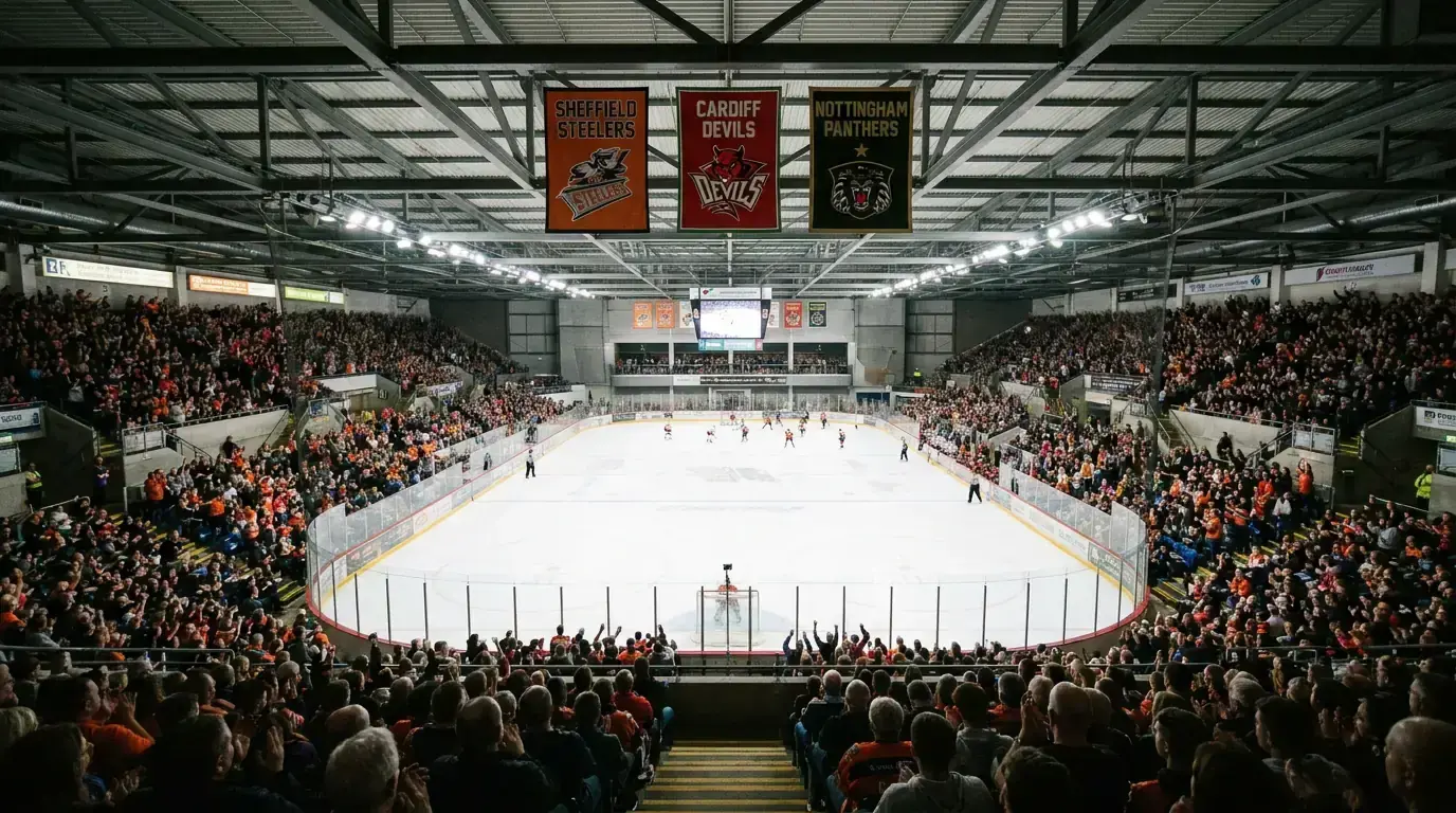 Packed EIHL arena in Britain with fans cheering during a professional ice hockey game