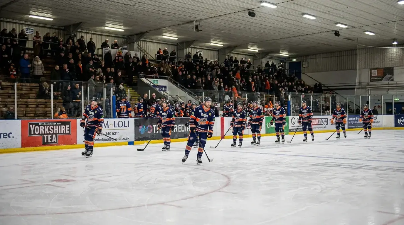 EIHL team lineup on the ice during warm-ups showing a mix of import and British players